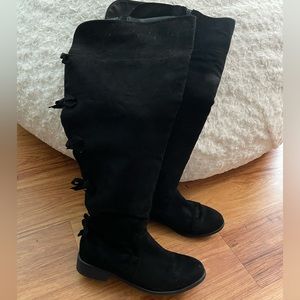 Torrid black knee high boots with bow design on back - size 11 W